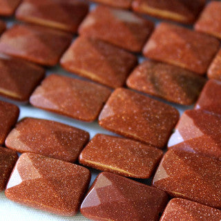 Goldstone Faceted Rectangle 10x14mm